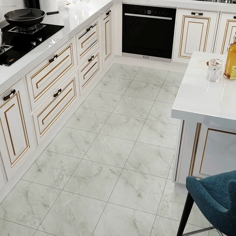 Wood Look Peel And Stick Vinyl Tiles 12x12 Inches, 24 Pack, in a kitchen setting with white cabinets and gray distressed planks