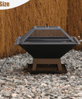 Compact 19.8 Inch Square Fire Pit With Removable Ash Pan And Mesh Lid, seen on gravel, shows size dimensions.