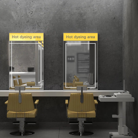Two salon chairs in front of mirrors with grey concrete texture peel and stick wallpaper 16x708 inch vinyl countertop and wall covering.