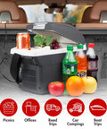 Compact 6 Quart Thermoelectric Cooler And Warmer For Car Rv And Truck with drinks and fruits in a car trunk.