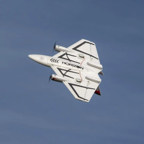 Ultra Micro RC Plane With Dope Twin Brushless Motors And Delta Wing BNF Basic Electric flying against blue sky