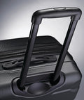 Samsonite Omni PC hardside carry-on luggage, black 20-inch, close-up of extended telescoping handle