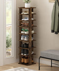 Wooden nine tier slim vertical shoe rack for small spaces free standing narrow organizer in entryway with shoes and potted plant