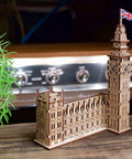 Big Ben 3D Puzzle Kit With 63 Pieces 7.12 Inch Brown Wooden Model Of Parliament Clock Tower DIY Wood Craft For Builders And History Buffs Dope And Easy Addictive Home Display Or Desk Decor., brown wooden Big Ben 3D puzzle with Parliament Tower and UK flag on desk