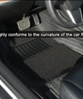 Custom Molded 4 Piece Floor Mats For Tesla Cybertruck 2025 2026 shown in vehicle, fitting the floor contour precisely.