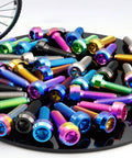 Colorful assortment of Beefed-Up Ultra Light Titanium Bolt M7x24.5mm With 1.0mm Pitch And 12 Point Spline Socket Forged Head
