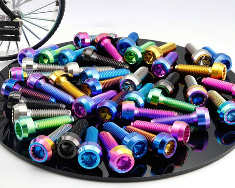 Colorful assortment of Beefed-Up Ultra Light Titanium Bolt M7x24.5mm With 1.0mm Pitch And 12 Point Spline Socket Forged Head