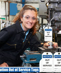 Out Of Service Notice Tags Kit With 30 White 5.5 By 3 Inch Signs in use on machinery in factory setting.