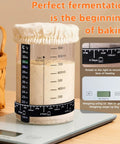 Close-up of 34oz starter jar on digital scale from All-In-One Sourdough Starter Kit With Enameled Cast Iron Dutch Oven, Digital Scale, And 4 Banneton Proofing Baskets, Beginner Guide, Sling, The Ultimate Bread Making Gift Set For Home Bakers.