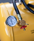 Grab And Go 5 Gallon Portable Air Tank With Sturdy Carry Handle And 125 Psi Max Pressure showing pressure gauge and valve.
