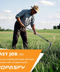 Man using a grass scythe in a field, showcasing easy yard work with Long Reach Weeding Tool Set With Serrated Double Edged Blade.