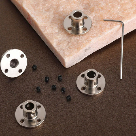 Four stainless steel 6mm rigid flange shaft couplers with set screws and hex key