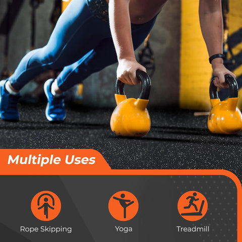 Person using kettlebells on Interlocking Gym Floor Mats With Rubber Top 0.4 Inch Thick 24 Pieces Covering 96 Sq Ft Dual Layer High Density EVA Foam Base With Rugged EPDM Rubber Surface Heavy Duty Home Gym Flooring For Exercise Gear Black And Grey