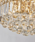 Modern K9 Crystal Raindrop Chandelier Ceiling Light With Brass Canopy, 9 Light Flush Mount, clear crystals close-up view