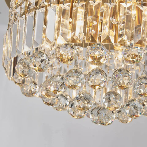 Modern K9 Crystal Raindrop Chandelier Ceiling Light With Brass Canopy, 9 Light Flush Mount, clear crystals close-up view