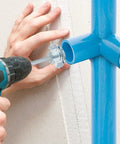 Pro Grade PVC Pipe Reamer For 1/2 Inch Fittings Inside Cutter Saver in use with speed drill on blue piping system