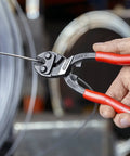 Person using CoBolt Compact Bolt Cutter With Notched Blade For Heavy Duty Cutting Up To 0.170 Inch Diameter on wire