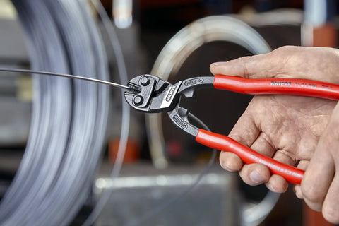 Person using CoBolt Compact Bolt Cutter With Notched Blade For Heavy Duty Cutting Up To 0.170 Inch Diameter on wire