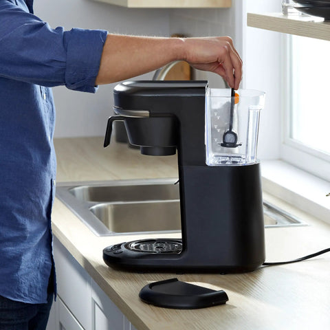 Placing Advanced Water Filter Cartridges For 12-Cup Programmable Coffee Makers, 2 Pack White, 60-Day Supply in coffee maker.