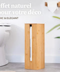 Bamboo Toilet Paper Storage Holder With Lid On A Sturdy Bamboo Base next to a toilet, space saving roll dispenser, eco-friendly design