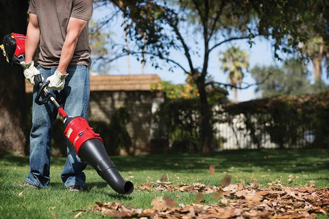 Person using High Performance Blower Attachment With Concentrator For Attachment Capable Trimmers Polesaws And Powerheads Delivers Up To 500 CFM Airflow
