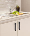 Oil Rubbed Bronze Curved Cabinet Handles Arch Drawer Pulls For Kitchen 3 Inch Hole Center installed on white cabinet doors