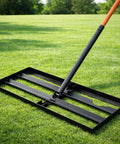 Stainless Steel Leveling Rake With 78 Inch Adjustable Handle, 30x10 Inch Leveling Tool in Bright Orange on grass