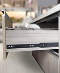 Rugged 18 Inch Full Extension Drawer Slides With Ball Bearings For Side Mount Cabinets Four Pack Black Steel Rails in open drawer.