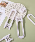 Adjustable U Shaped Childproof Cabinet Locks 15 Pack No Tools Needed Easy Install ABS Material Safe Latches displayed on green surface