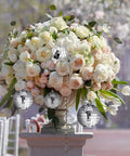 Floral display with 30 Pcs Mini Disco Ball Ornaments Hanging Mirror Balls For Party Decor Wedding on a garden stand