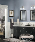 Bathroom with Eva Brushed Nickel Single Post Open Hand Towel Ring For Bathroom That Adds Quick Style With No Fuss Easy Install Wall Mounted Towel Holder Coordinating Bath Accessory From Eva Collection YB2886BN next to mirror and sink.
