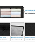 Three Pack Foldable Clothes Storage Bags With Large Clear Window And Sturdy Handles 35L Black For Closet Dorm Pillows Bedding Clothes And Blankets Great For Small Spaces, showing clear window and sturdy zipper.