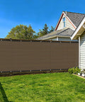6 Foot By 50 Foot Privacy Fence Screen 180 GSM Heavy Duty Shade Net With Reinforced Bindings And Grommets in a backyard setting