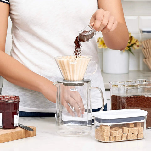 Clear Coffee Scoop For POP Storage Containers, 2 Tbsp 30 mL Capacity, scooping ground coffee into a dripper