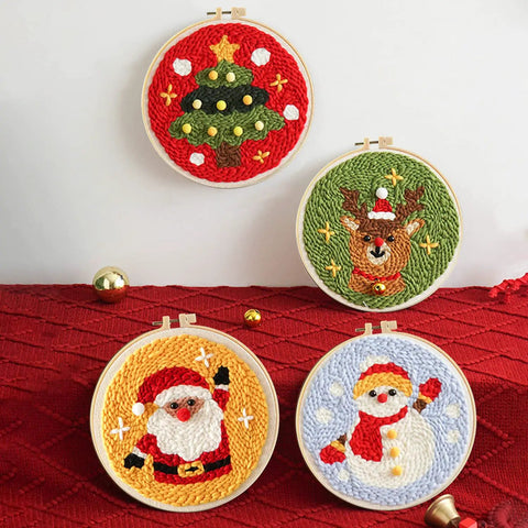 Punch Needle Kit For Beginners With Wooden Handle Tools featuring Christmas-themed embroidery hoops with Santa and reindeer designs.