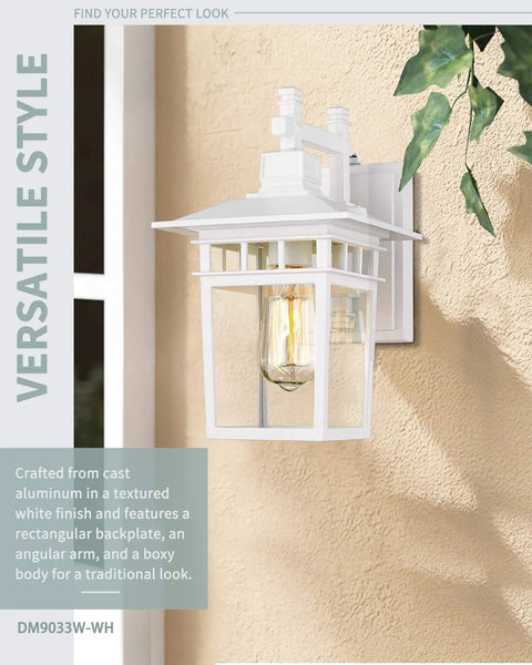 White exterior light fixture with cast aluminum housing mounted on wall showcasing angular design and glass panels
