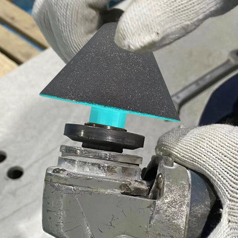 Worker using Pro Grade Diamond Beveling Chamfer Bits For Countersinking And Enlarge Holes In Tile Marble Glass Granite Ceramic 27mm To 82mm Dia With 5 8 By 11 Threads Blue on angle grinder