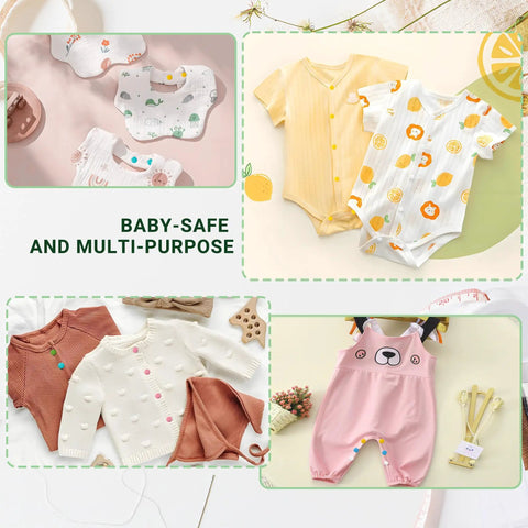 Various colorful baby clothing including onesies, bibs, and rompers with animal prints displayed on a flat surface.