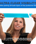 Woman holding Ultra Clear Full Face Shield demonstrating anti-fog feature; Pro Grade PET Plastic with protective film.