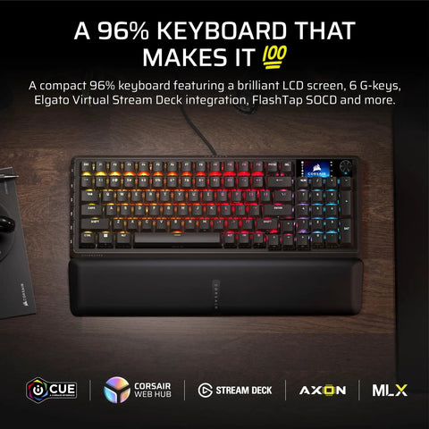 96 Percent Compact Mechanical Gaming Keyboard With Smooth Linear Switches That Hit Different Combined With A Built In LCD Stream Deck Rotary Knob And Dedicated Macro Buttons For Players Who Mean Business On The Battlefield displayed on a wooden desk with lit keys.