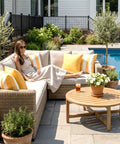 Outdoor pillow covers set of 2 18x18 waterproof throw pillow covers on patio furniture by pool with woman relaxing nearby.