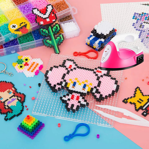 ACHENYUANYUAN Mini Heat Press Machine With Charging Base For DIY Crafts next to vibrant perler bead designs and crafting tools.