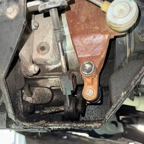 Close-up of manual transmission linkage showing Heavy Duty Transmission Shift Cable Kit For Focus 2005 2009, 98WT7288A2A