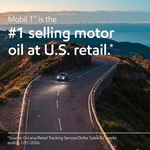 Top Shelf High Mileage Full Synthetic Motor Oil In 0W-20 Viscosity With 5 Quart Container on a winding road near mountains.