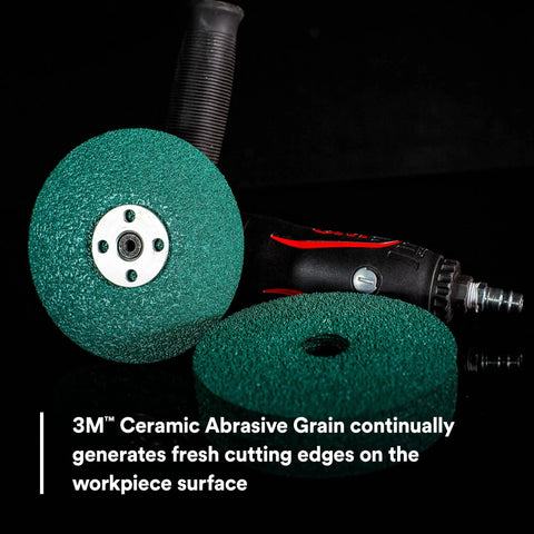 Ceramic Abrasive Fiber Disc 7 In X 7/8 In 60 Grit Resin Bond For Metal Grinding And Welds close-up on a grinder