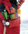 Worker with red tool pouch holding a ratcheting screwdriver with one hand switch left right lock magnetic bit holder