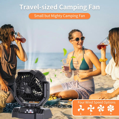 Beast 20000mAh Portable Camping Fan with Remote Control on beach with people, black, USB C Rechargeable for outdoors.