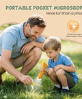 Portable Handheld Digital Microscope For Kids With 1000x Magnification Crystal Clear 1080p Images On A Two Inch IPS Screen Plug And Play USB Connection Easy To Use For Curious Minds To Explore The Micro World. father and child using an orange pocket microscope outdoors on grass