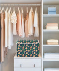 Foldable Storage Bin With Flip Top Lid And Reinforced Handles For Bedroom Closet on shelf with clothes, 300D Oxford fabric, colorful design.