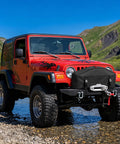 Cool Covertify Heavy Duty Winch Cover With Buckle, 600D Oxford Fabric waterproof protection on red Jeep by water.